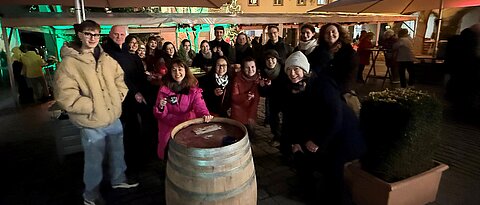 Foto der Italienisch-Studierenden und -Dozierenden auf dem Weihnachtsmarkt 2025